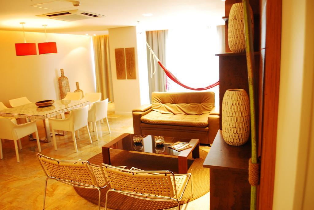 Ghl Hotel มอนเตริอา ห้อง รูปภาพ A living room in a typical apartment
